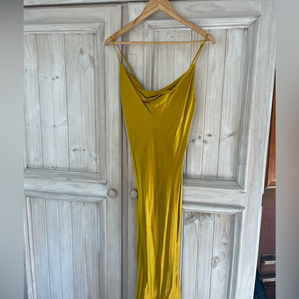 Golden colored satin dress